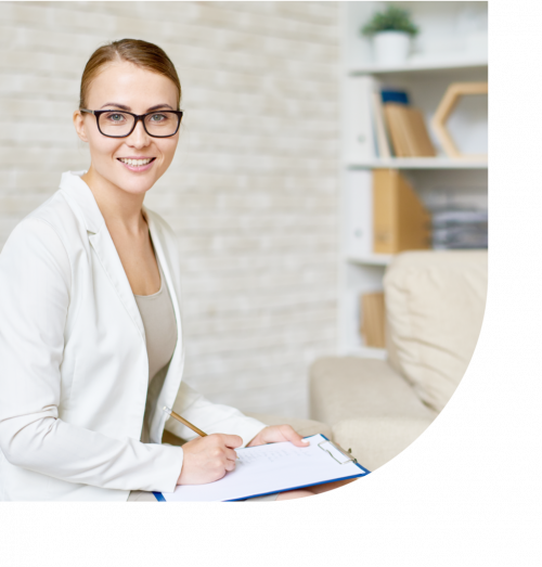 A female therapist holding a clipbaord