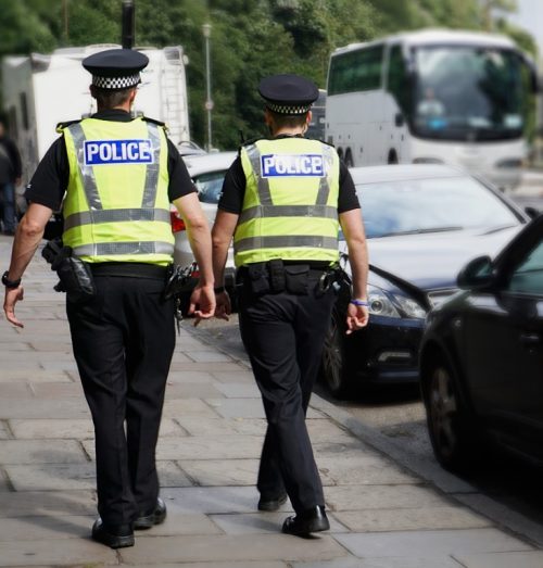 Police officers on duty walking